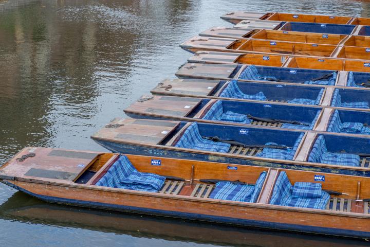 a wooden boat in a body of water