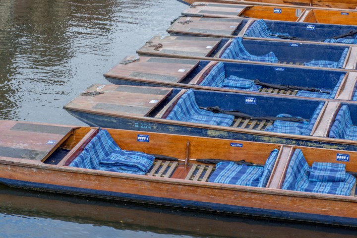 a wooden boat in a body of water