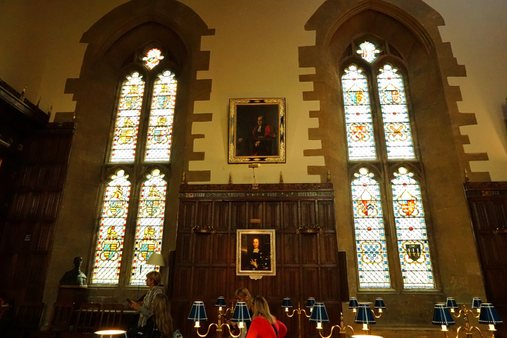 a large clock mounted to the side of a building