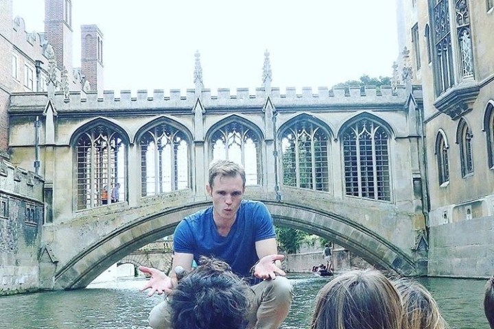 a person sitting on top of a building