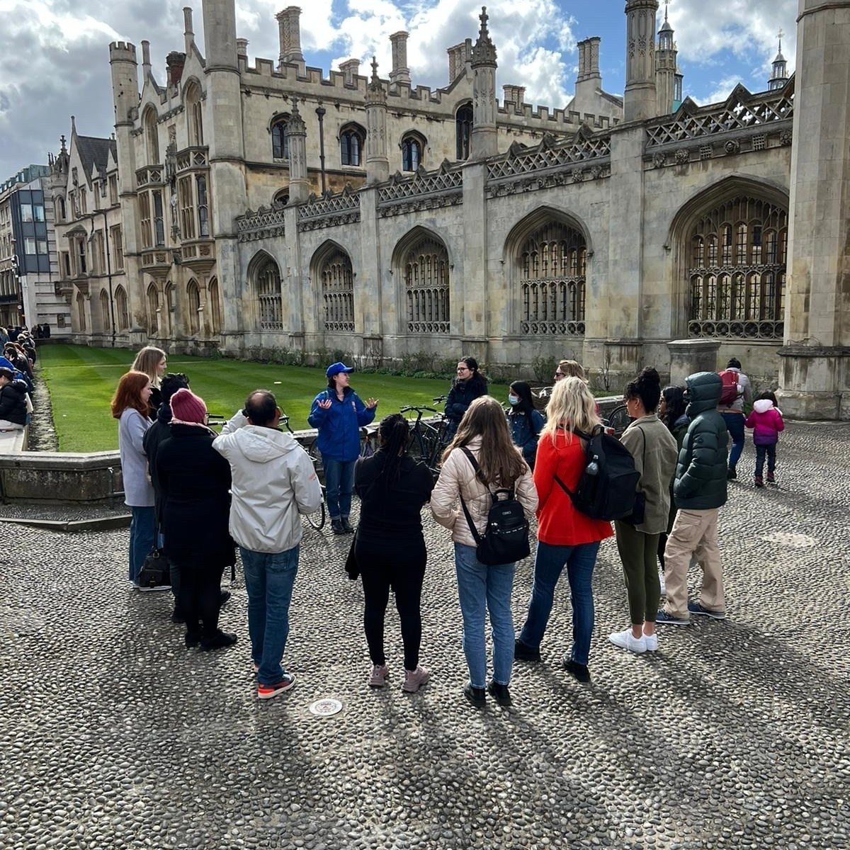 a group of people standing in front of a building