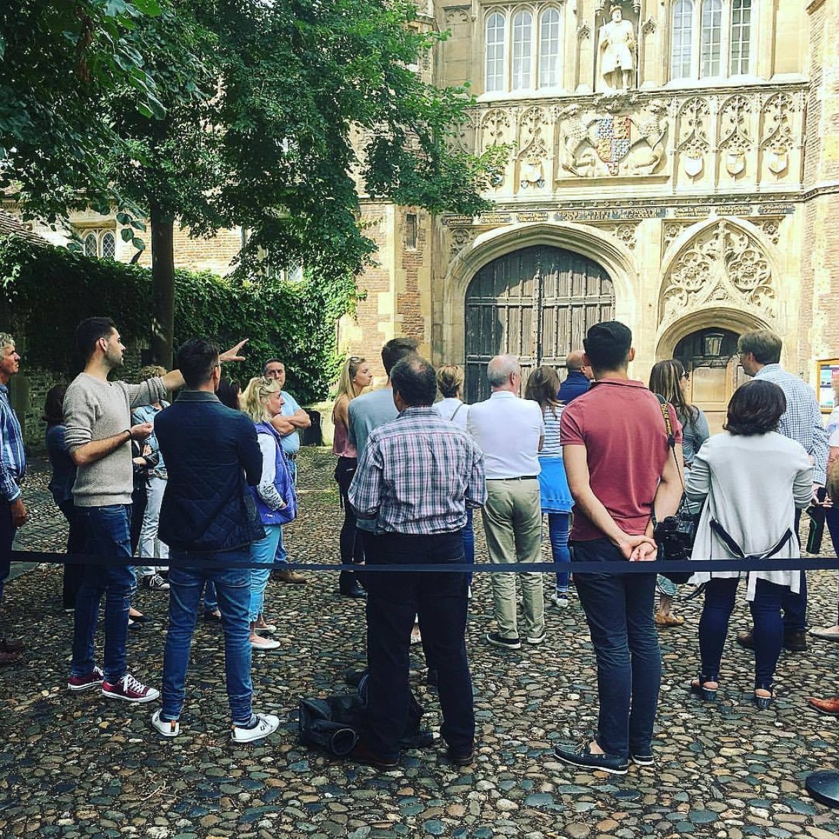 a group of people standing in front of a building